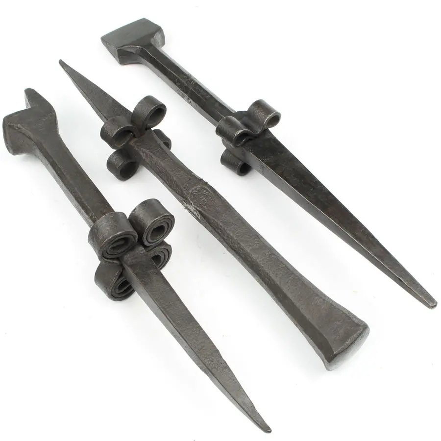 Sold - 3 Vintage Scythe / Stake Anvils 1