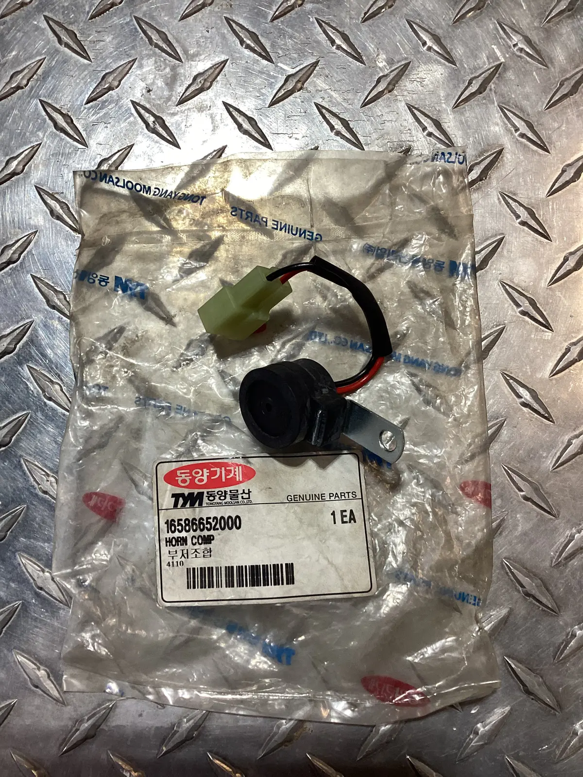 Tym/Mahindra Horn Comp., 16586652000 1