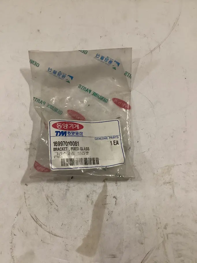 Tym/Mahindra Tractor Bracket Fixed Glass, 16997010061 1