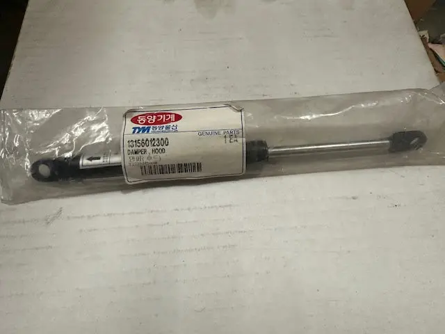 Tym / Mahindra Hood Damper, 13156012300 1